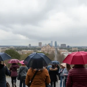 People in San Antonio holding umbrellas during rainy weather